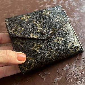 Louis Vuitton small monogram wallet ( unisex )